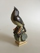 Bing & Grøndahl 
K. Otto 
Johansen 
Stentøjs 
Figurine No 
7034 af Fugl. 
24 cm H. I fin 
stand.