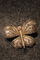 Gammel 
sommerfugle 
broche i sølv 
filigran.
Måler:6x5,5cm.
