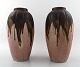 Gilbert 
Metenier, 
fransk 
keramiker. Et 
par Art Deco 
keramikvaser i 
flammende 
glasur. ...