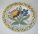 Kellinghusen 
deep Plate, 
19th century. 
Germany. 
Polychrome 
decoration with 
flowers. Dia: 
23.2 ...