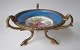 Tassa in gilded 
bronze with 
porcelain bowl, 
19/20. century. 
France. White 
porcelain bowl 
with ...