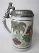 German 
earthenware 
beer mug, 18th 
century. With 
pewter lid with 
lion.
Grey mite with 
...