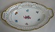 Porcelain dish, 
pierced, 
Germany, about 
1910. Stamped: 
Schwarzhammer, 
Bavaria. 
openwork with 
two ...
