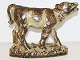 Large Royal 
Copenhagen 
stoneware 
figurine, calf 
standing on 
base.
Designed by 
artist Knud ...