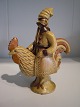Polsk 
lertøjsfigur af 
"Kropnek på 
hanen" figur 
fra et polsk 
folkeeventyr - 
han flygter fra 
sin ...