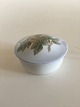 Royal 
Copenhagen Art 
Nouveau Lidded 
Bowl with 
Flower Motif No 
173/1. 5 cm H 
(1 31/32"). 9 
cm dia ...