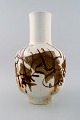Large Royal 
Copenhagen / 
Aluminia vase 
by Nils 
Thorsson.
Decorated with 
swimming fish.
Model ...