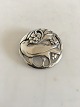 Georg Jensen 
Sterling Sølv 
Broche No 175. 
Måler 4.5 cm Ø. 
Vejer 16 gram.