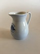 Bing & Grondahl 
"Hotel" 
Sparekassen 
Haderslev 
Creamer No 
3041. 9 cm H. 
In nice whole 
condition.