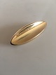 Hans Hansen 14K 
Guld Broche No 
102. Måler 5,6 
cm. Vejer 10 
gram. I fin 
stand.