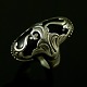 Georg Jensen. 
Ring i sterling 
sølv med sort 
agat #18
Tegnet af 
Georg Jensen  
1866 - ...