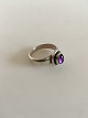 Georg Jensen 
Sterling Sølv 
Ring Nr. 46C 
med Amethyst. 
Ring Str. 55. 
Vejer 5 gram. 
Stenen måler 
...