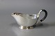 Sovsekande med 
ibenholt hank i 
925 sterling 
sølv stemplet 
Cohr.
H - 9 cm, B - 
17,5 og D - 7,5 
cm.