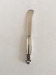 Georg Jensen 
Sterling Silver 
Acorn Butter 
Spreader No 
046. Measures 
15 cm / 5 
29/32"