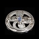 Georg Jensen 
Broche i 
Sterling Sølv 
med månesten 
#138
Tegnet af 
Georg Jensen 
1866 - ...