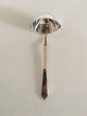 Georg Jensen 
Sterling Silver 
Pyramid Gravy 
Ladle No 153. 
Measures 18 cm 
/ 7 3/32"