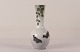 Royal 
Copenhagen
Stor slank 
vase nr. 560/34 
med stempel fra 
perioden 
1894-1923
Dekoreret med 
...