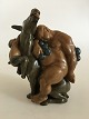 Kai Nielsen 
Stentøjsfigur 
no. 26 Sovende 
Bacchus  og 
klatrende Faun 
på Æsel. 23 cm 
H. 18 cm B. I 
...