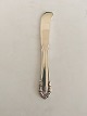 Georg Jensen 
Sterling Sølv 
Liljekonval 
Smørkniv No 
046. Måler 15 
cm. Design 
Georg Jensen 
1913.