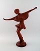 Keramos, Wien, 
dansende 
kvinde, figur i 
rødler. Art 
deco.
Modelnummer 
8713.
Flot figur, 
ca. ...