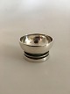 Georg Jensen 
"Pyramide" 
Sterling Sølv 
Saltkar No. 
632. (Uden 
glasindsats) 
2.5 cm Høj. 4 
cm Ø. ...