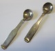 Two salt spoons 
in sterling 
silver, 20th 
century. F. 
Hingelberg, 
Aarhus. 
Denmark. 
Length: 7 cm. 
...