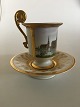 Royal 
Copenhagen 
Empire Løve Kop 
med motiv af 
Frederiksborg 
Slot fra 
1820-1850.
Måler 11,3cm 
...