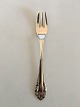 Georg Jensen 
Sølv 830S 
Liljekonval 
Kagegaffel No 
043. Måler 14,3 
cm
