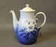 Coffee Jug in 
Christmas Rose 
by Bing & 
Grøndahl, no.: 
91A.
H - 27 cm, W - 
22 cm and D - 
15 cm.