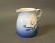 Cream jug in 
Christmas Rose 
by Bing & 
Grøndahl, no.: 
189.
H - 11 cm and 
Dia - 7,5 cm.