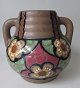 Tysk art deco 
vase med to 
hanke, ca. 
1930. 
Lert&oslash;j. 
Brun 
underglasur med 
polykrom ...