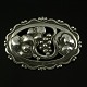 Georg Jensen 
Skønvirke 
Broche i 
Sterling Sølv 
#177A
Tegnet af 
Georg Jensen 
1866 - ...