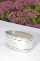 Tretårnet sølv 
830s. 
Servietring, 
længde 5 x 2,7 
cm. højde  2,5 
cm. Vægt 32 
gram. Pæn 
stand, med ...