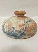 Hot-water bottle, pottery, made by Knabstrup 
Lervarefabrik (pottery) (1856-1988), antique
Branded (see photo) and rare hot-water bottle
H: 10,5cm, Diam: 23cm
Please note: Look at the photo to see the bottom