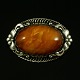 Ferdinand 
Svinth. 
Skønvirke 
Broche i Sølv 
med rav.
Tegnet og 
udført hos 
Ferdinand 
Svinth - ...