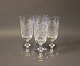 Sæt af 4 
champagne glas 
dekoreret med 
bladmotiv. 
H - 17 cm og 
Dia - 6 cm.
