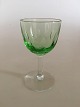 Holmegaard 
Murat 
Hvidvinsglas 
med Grøn Kumme 
11.5 cm H. Ca. 
6 cm dia. 
Oliver slibning 
og glat ...
