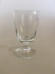 Holmegaard 
Almue 
Hvidvinsglas. 
11.5 cm Høj. 
5.5 cm 
diameter. 
Design Per 
Lütken