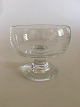 Holmegaard 
Almue Dessert 
Glass. 9.5 cm 
H. 10 cm 
diameter. 
Design by Per 
Lütken.