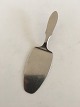 Georg Jensen 
Stainless Mitra 
Mat Lille 
Serveringspade. 
Måler 15,6 cm