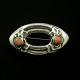 Georg Jensen 
Skønvirke 
Broche i Sølv 
med koraler 
#34. 1904-08 
Tegnet af 
Georg Jensen 
1866 - ...