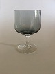 Holmegaard 
"Atlantic" 
Rødvinsglas. 
12.8 cm H. 
Røgfarvet glas 
med klar stilk. 
Designet af Per 
...