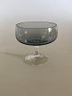 Holmegaard 
"Atlantic" 
Likørskål, 
Stor. 8 cm H. 
Røgfarvet glas 
med klar stilk. 
Designet af Per 
...