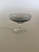 Holmegaard 
"Atlantic" 
Likørskål, 
Lille. 6 cm H. 
Røgfarvet glas 
med klar stilk. 
Designet af Per 
...