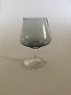 Holmegaard 
"Atlantic" 
Cognac Glas. 
11.5 cm H. 
Røgfarvet glas 
med klar stilk. 
Designet af Per 
...