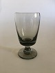 Holmegaard 
"Almue, Smoke" 
Claret Glass. 
14 cm H. 
Designed by Per 
Lütken