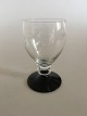 "Jane" 
Blackfooted 
Claret Glass 
from Holmegaard 
with ingraved 
grapes. 12 cm 
H. Manufactured 
...