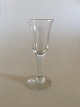 "Hvid Klokke" 
Snapsglas 
Holmegaard. 
13.5 cm H. 
Design Ole 
Winther 1974.