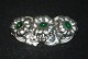 Broche i 
Jugendstil sølv
Stempel: 830S, 
OXO, N.M.
Sølvsmed: 
1937-
1947	Nicolai 
Søren ...