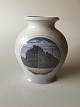 Royal 
Copenhagen Art 
Nouveau Vase 
No. 3403 with 
motif of 
Bredgadepalæ. 
23 cm H. 20 cm 
wide. 1st ...